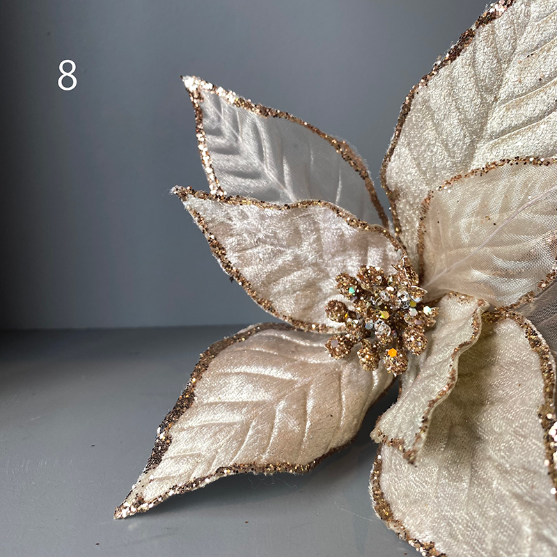 ベルベット調、レース素材のベージュカラーのポインセチア。ゴールドラインのグリッターが高級感あふれるデザインとなっています。